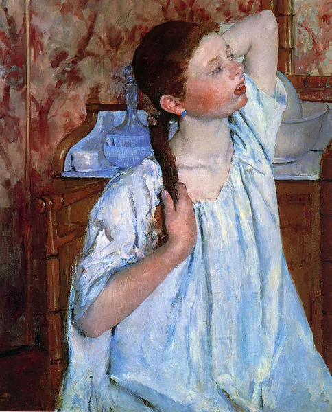 Girl Arranging Her Hair by Mary Cassatt, 1886