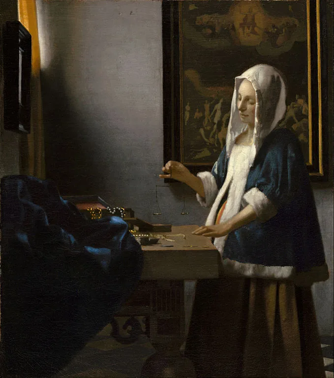 Woman Holding a Balance by Johannes  Vermeer, 1663